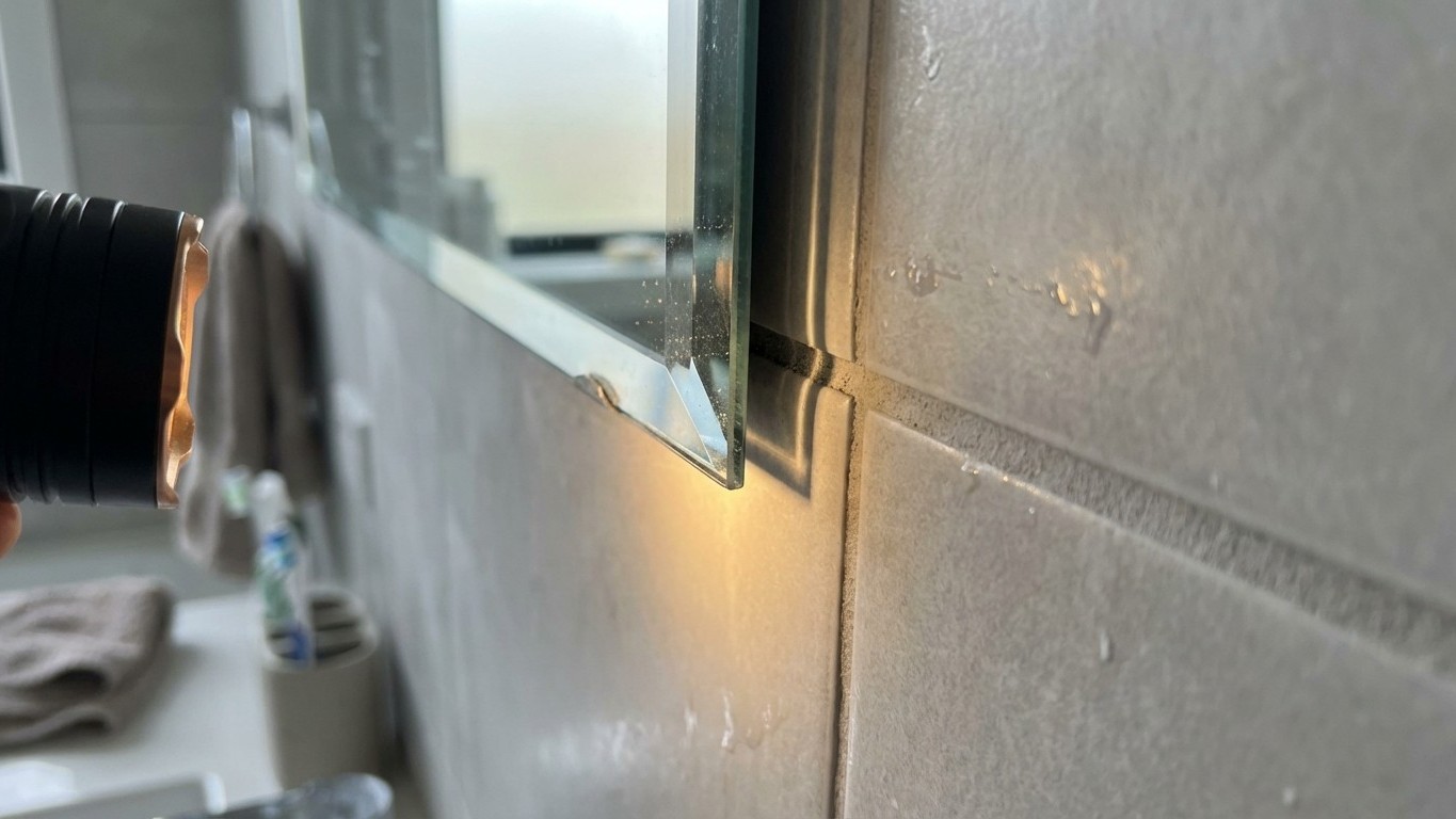 Why Your Adhesive Mirror Strip Could Fall Without Warning: What Glass Fitters Know