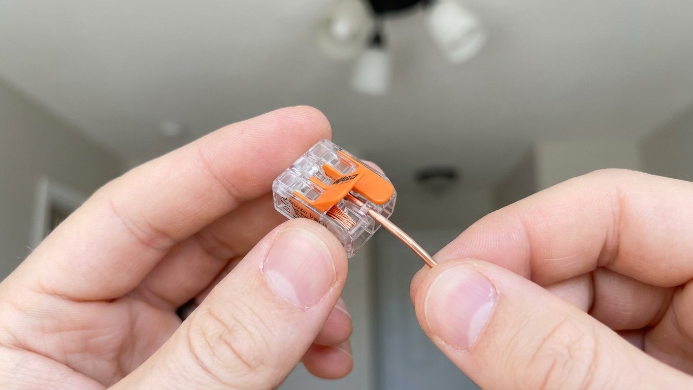 The Hidden Fire Hazard in Your Ceiling: Why Twisted Wires and Tape Could Burn Your Home Down