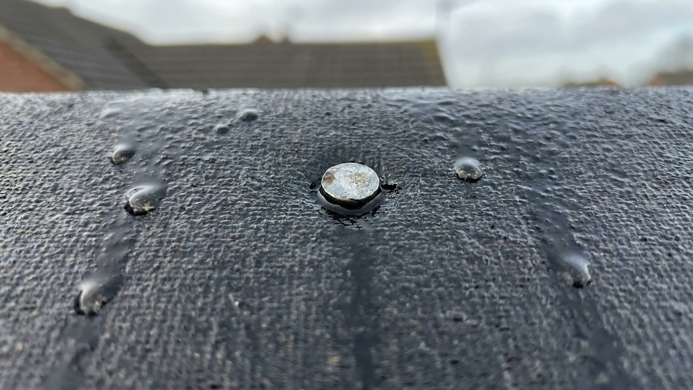 I nailed my shed felt flat across the middle of every sheet just to stop it lifting in the wind: the first heavy downpour,...
